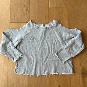 Cold shoulder raw hem sweatshirt